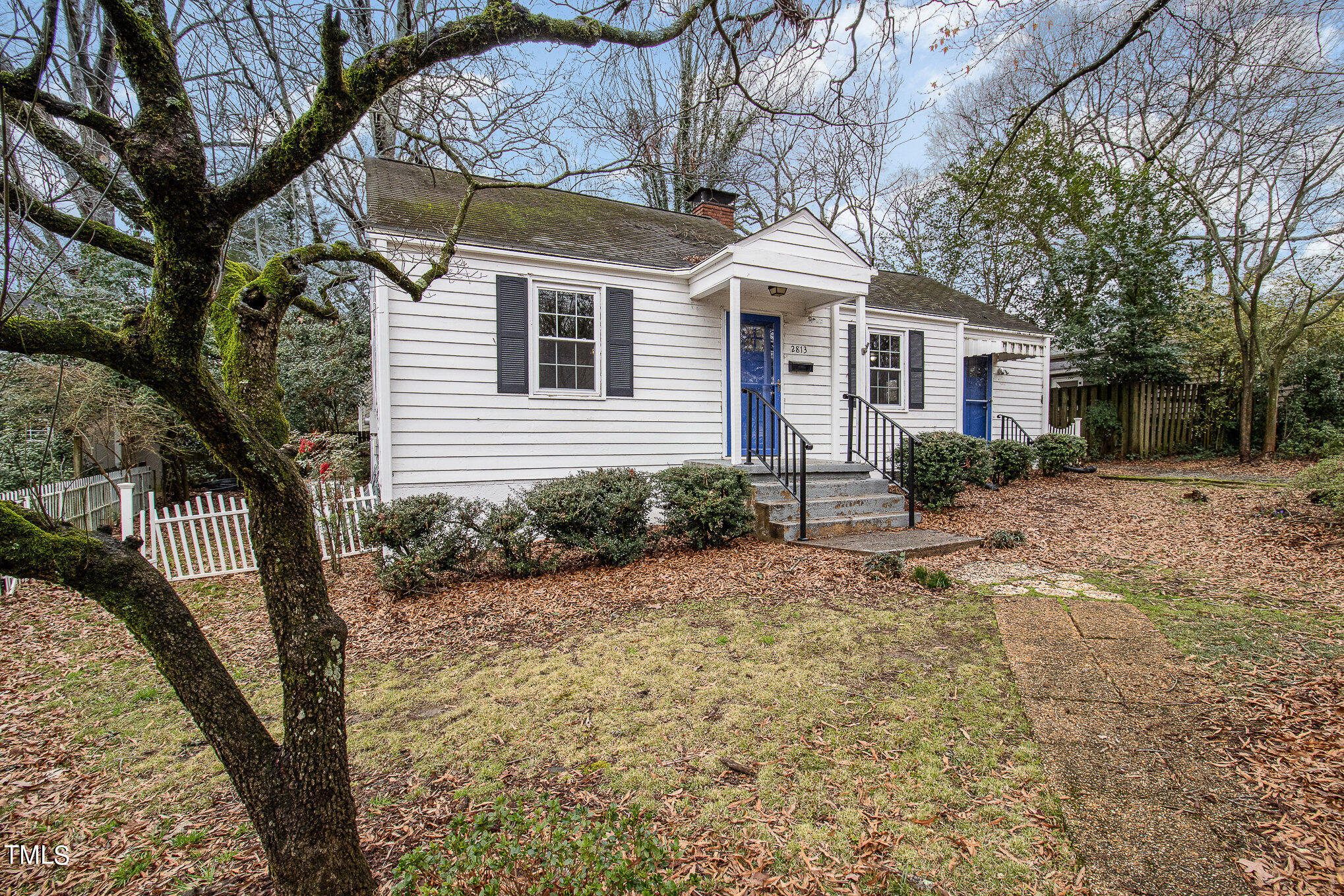 2813 Fowler Avenue Raleigh, NC 27607 - Photo 3 of 30 a front view of a house with garden
