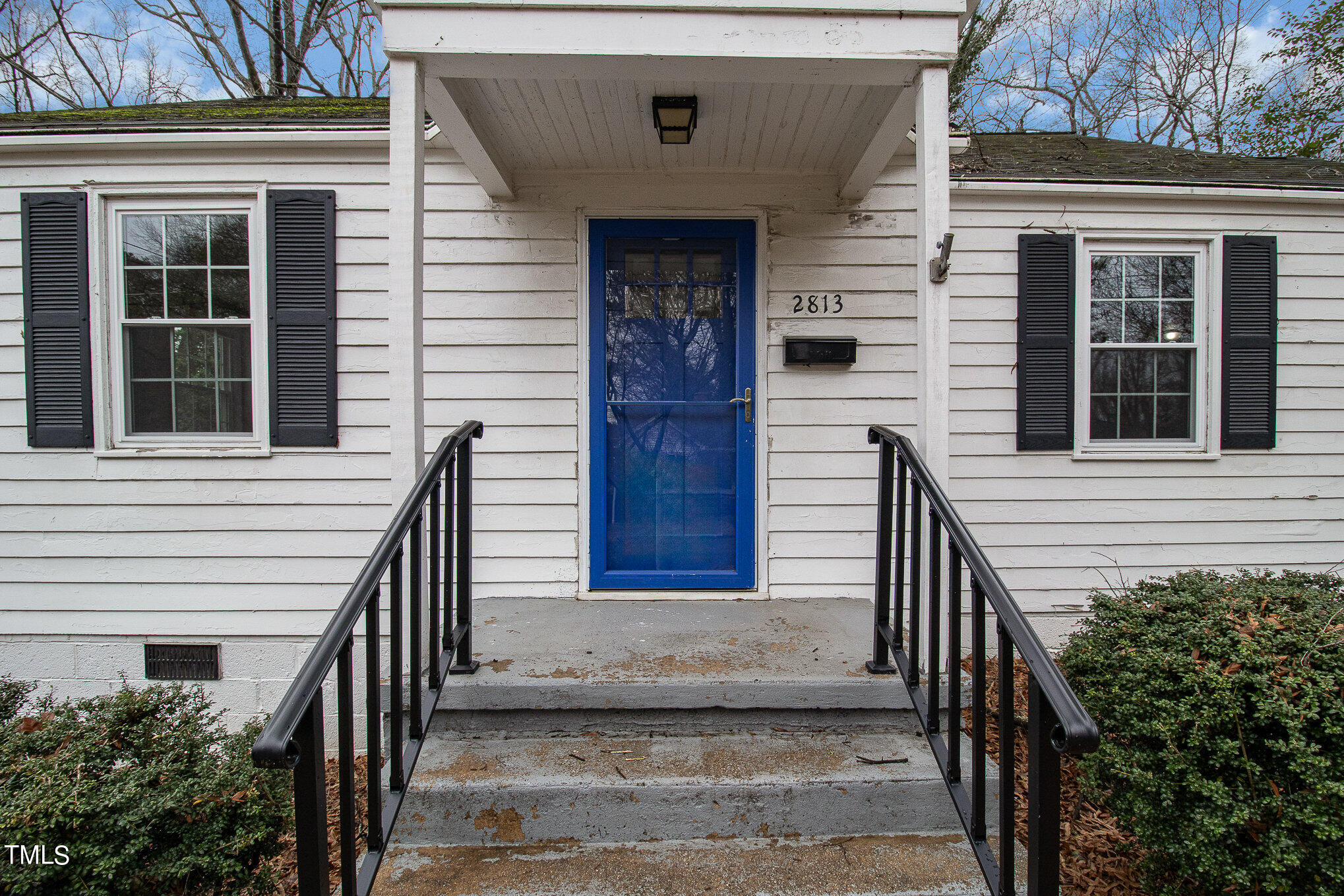 2813 Fowler Avenue Raleigh, NC 27607 - Photo 4 of 30 a front view of a house with a garden