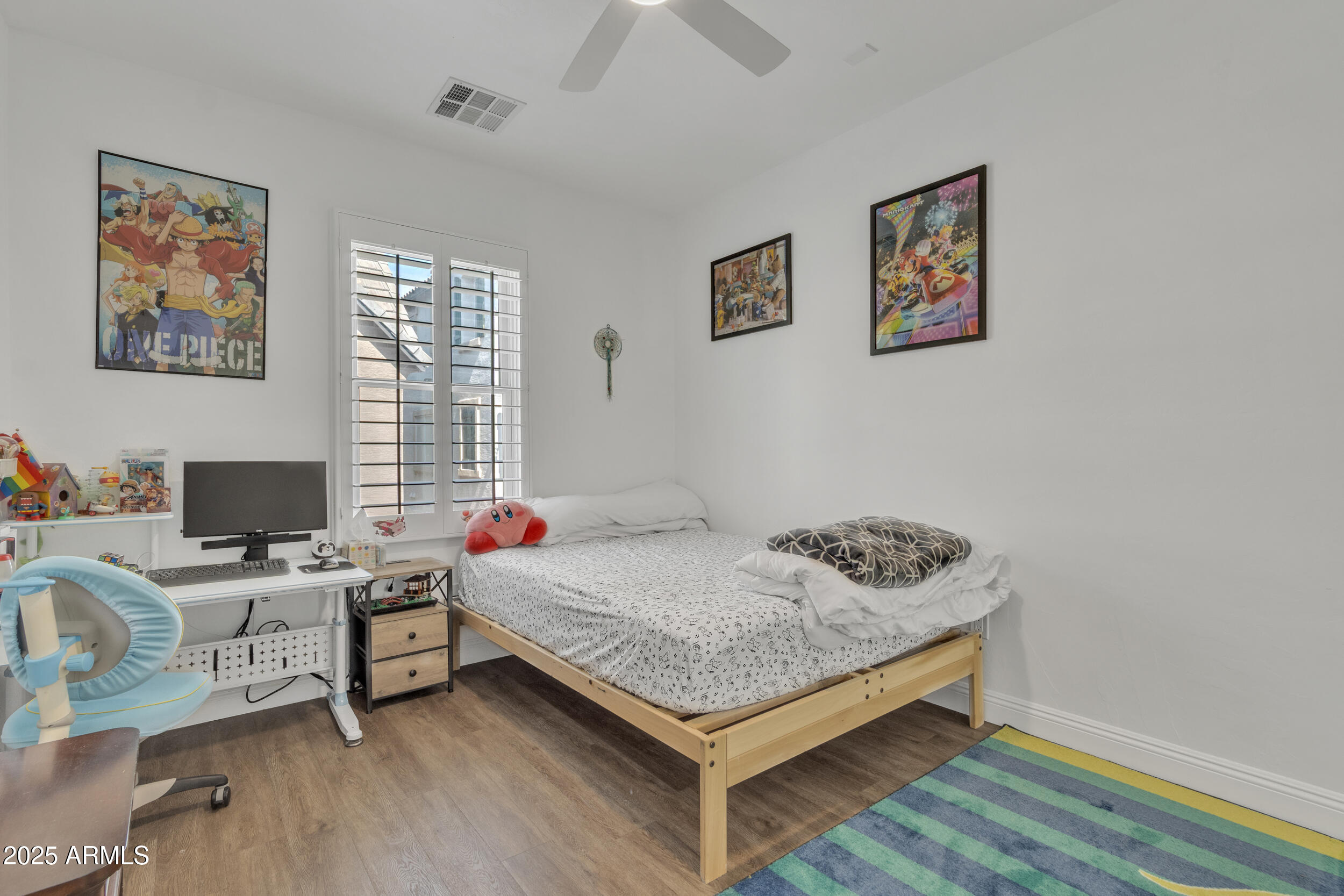 4159 East Jasper Drive Gilbert, AZ 85296 - Photo 10 of 26 a bedroom with a bed and a desk