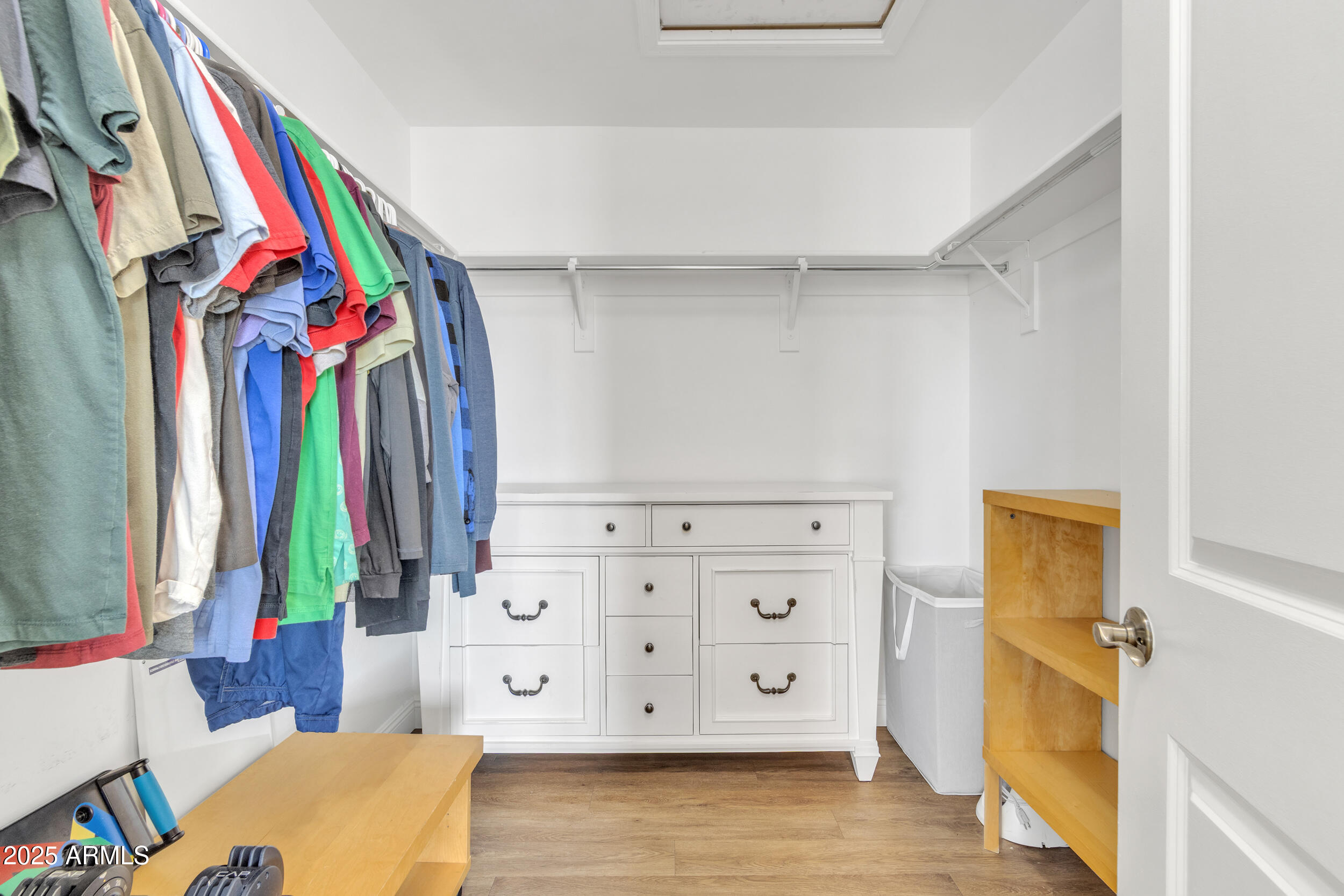 4159 East Jasper Drive Gilbert, AZ 85296 - Photo 19 of 26 a view of a bedroom with a large bed and a dresser