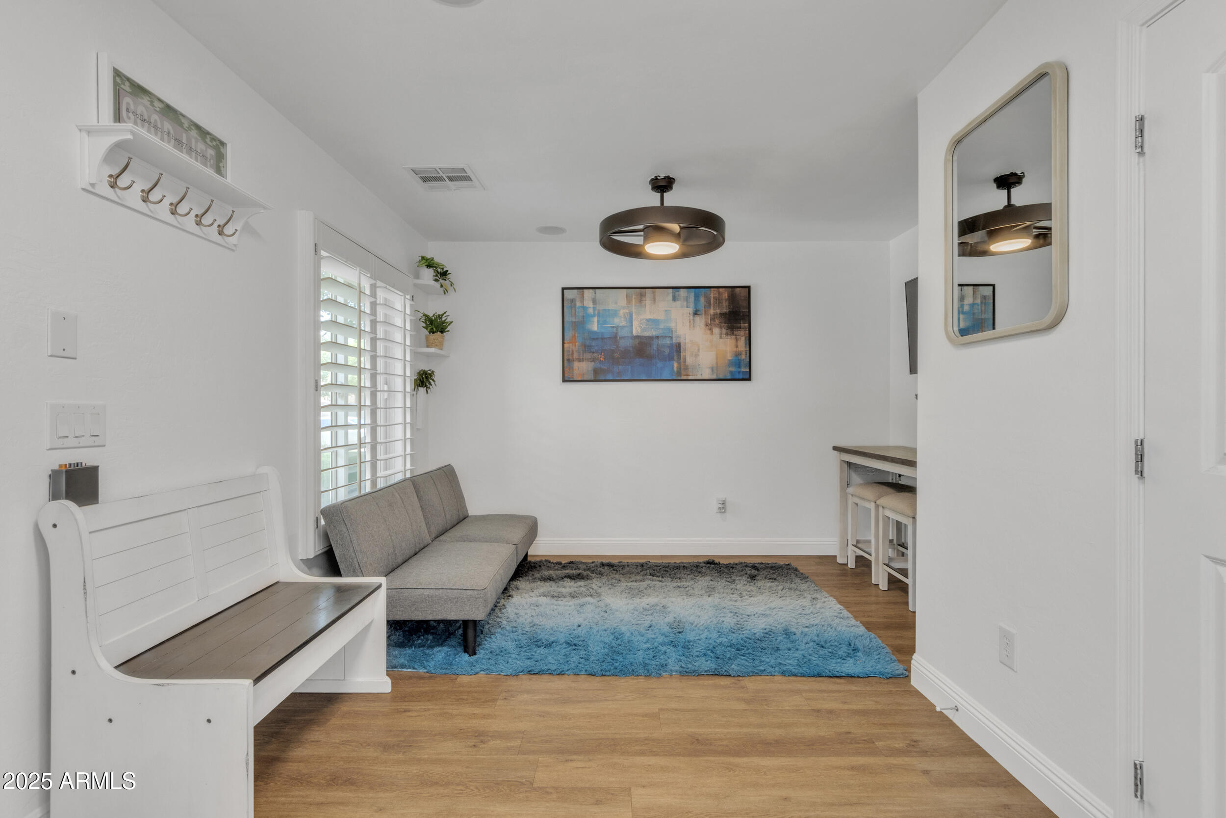 4159 East Jasper Drive Gilbert, AZ 85296 - Photo 21 of 26 a view of livingroom with furniture and window