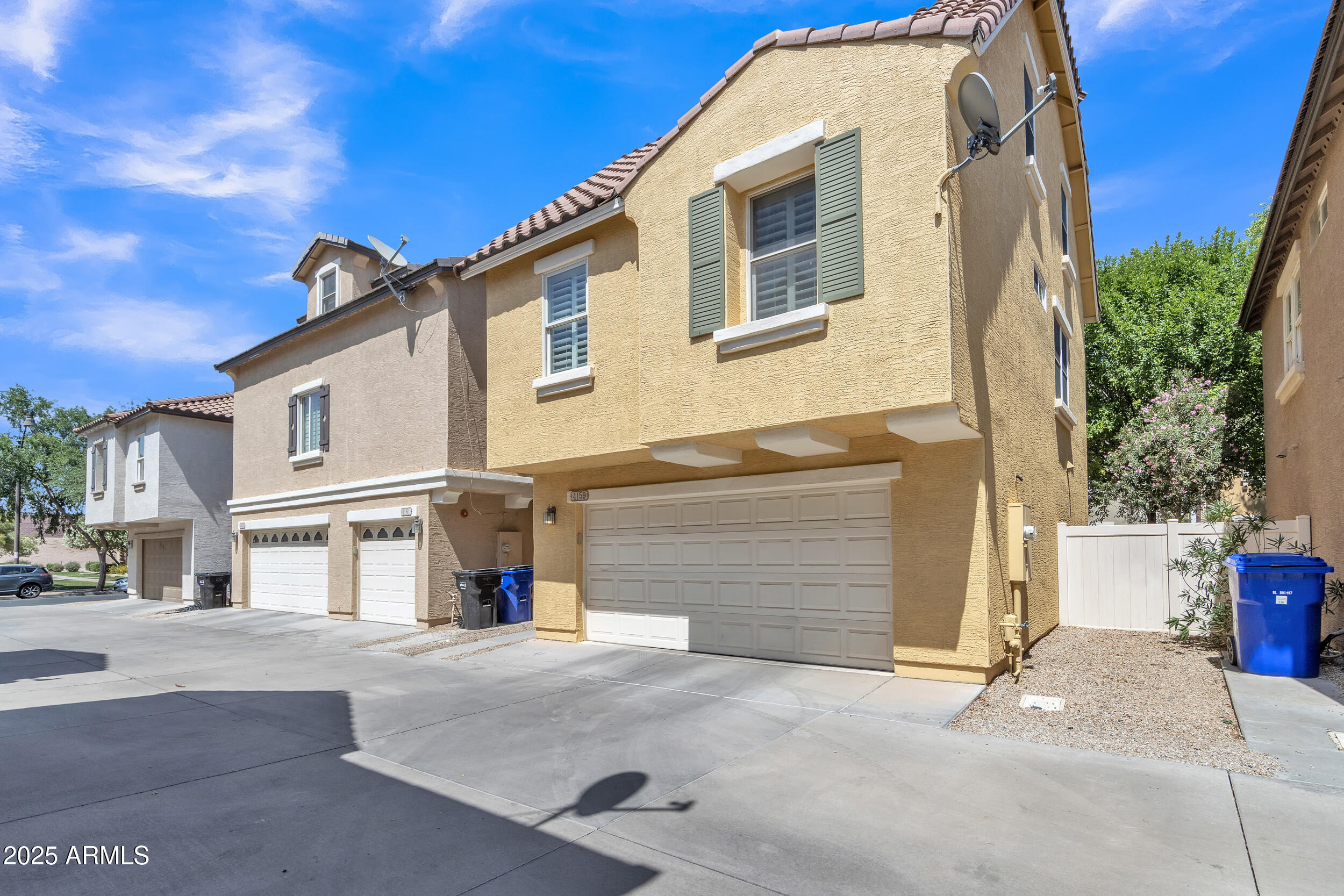 4159 East Jasper Drive Gilbert, AZ 85296 - Photo 23 of 26 a front view of a house with a road