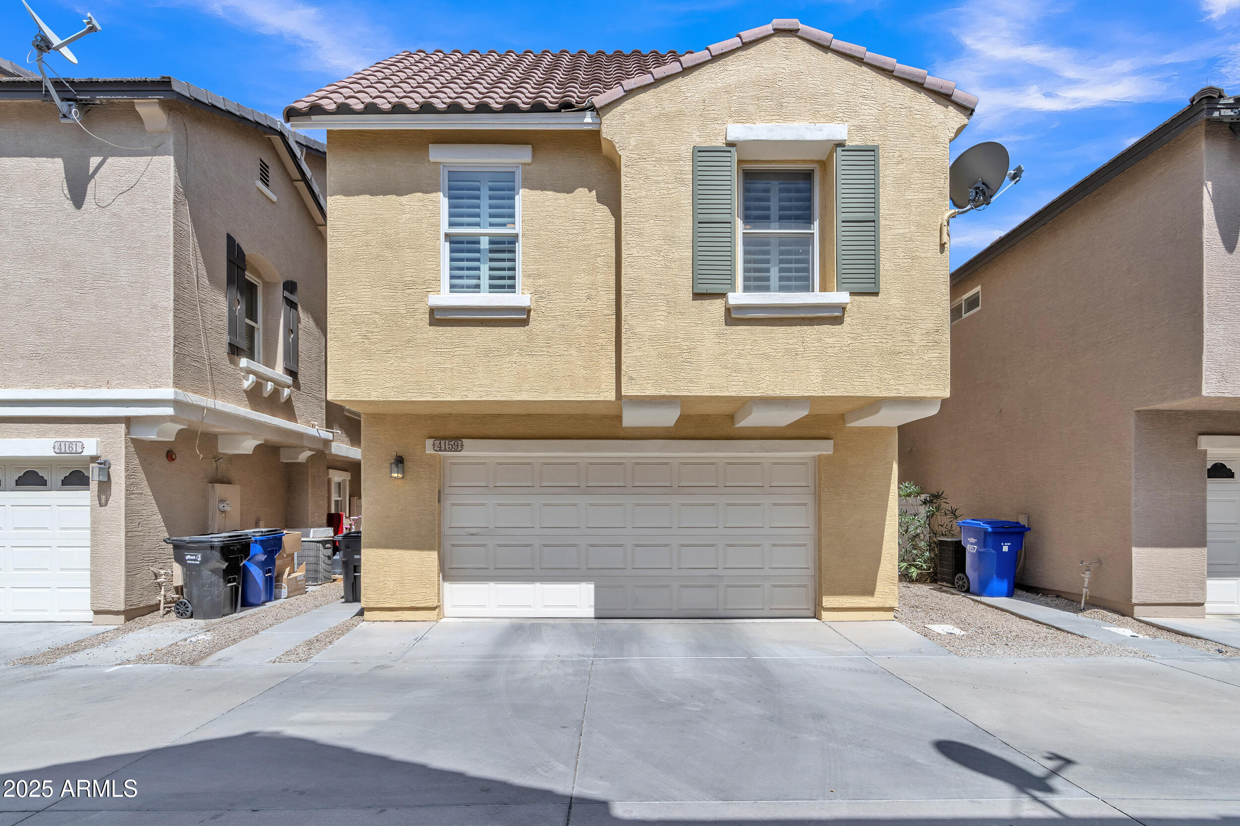 4159 East Jasper Drive Gilbert, AZ 85296 - Photo 24 of 26 a front view of a house with a garage