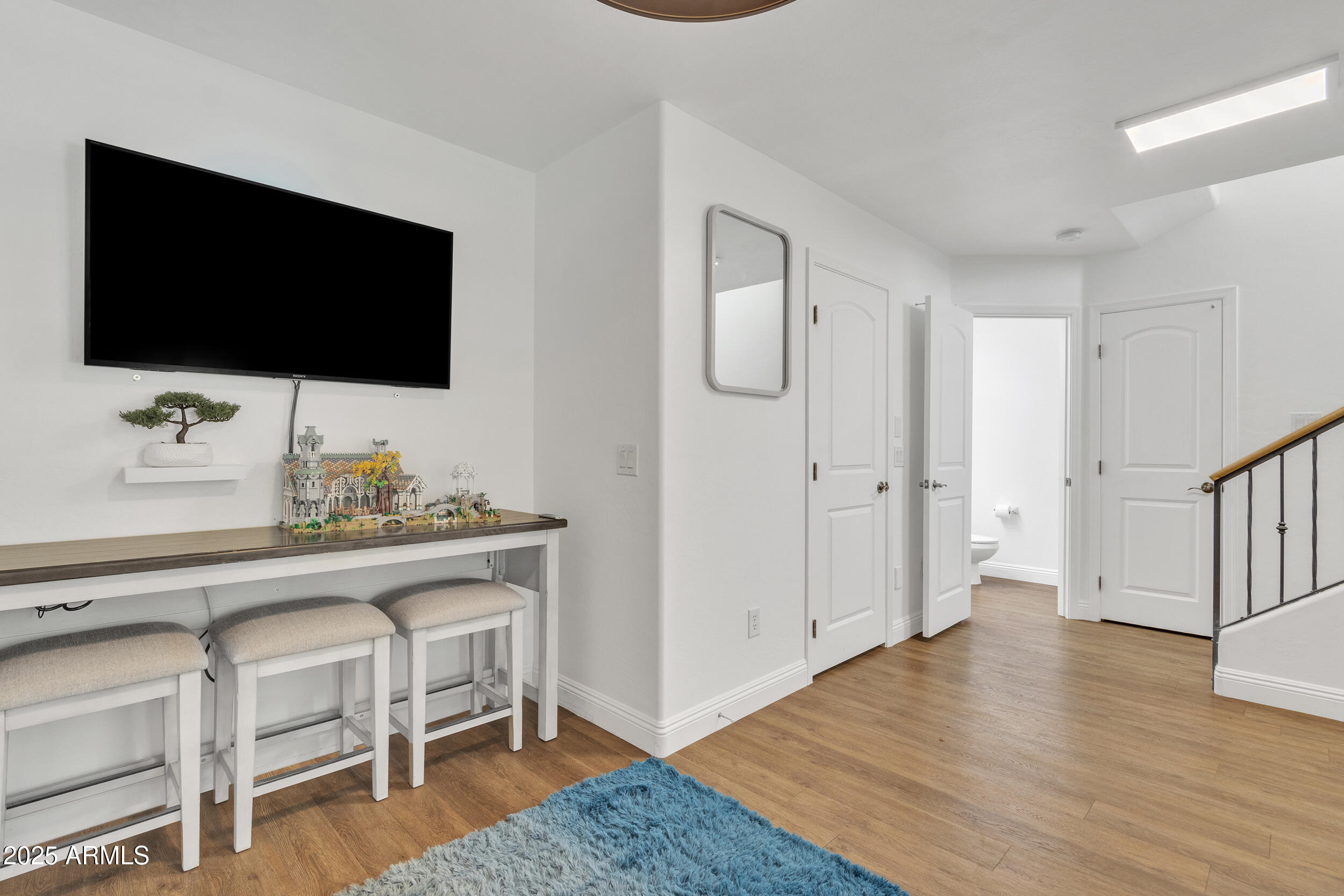 4159 East Jasper Drive Gilbert, AZ 85296 - Photo 4 of 26 a living room with furniture and a flat screen tv