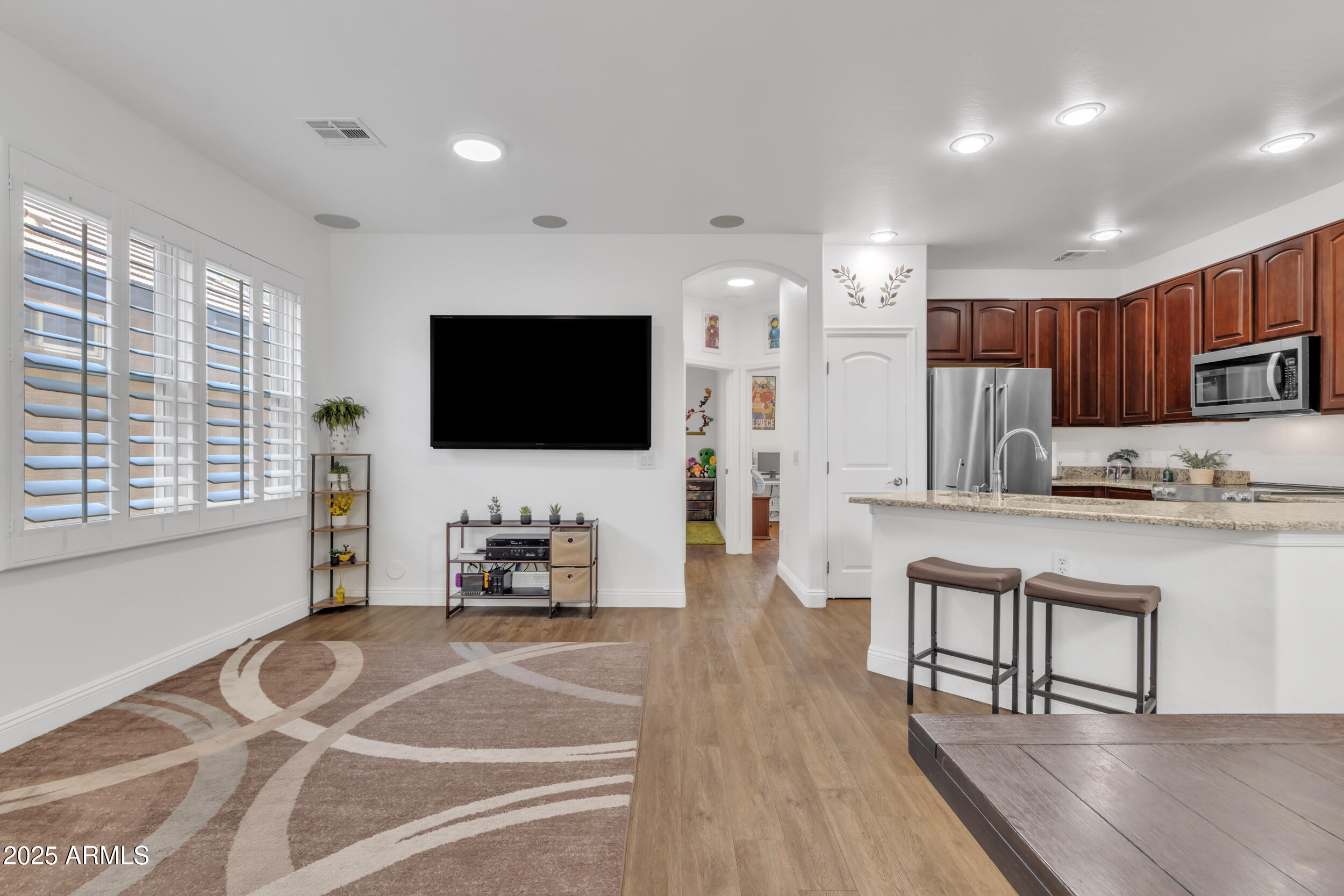 4159 East Jasper Drive Gilbert, AZ 85296 - Photo 5 of 26 a living room with furniture and a flat screen tv