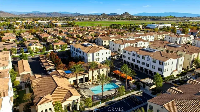 a view of a city with mountains