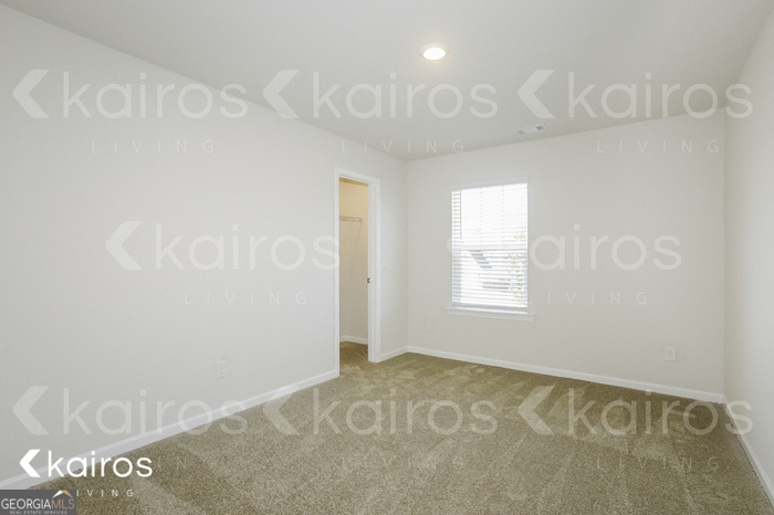 7008 Pinehurst Way North Macon, GA 31216 - Photo 11 of 16 a view of an empty room and window
