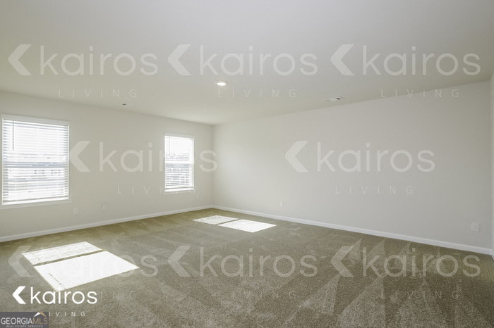 7008 Pinehurst Way North Macon, GA 31216 - Photo 6 of 16 a view of an empty room with a window