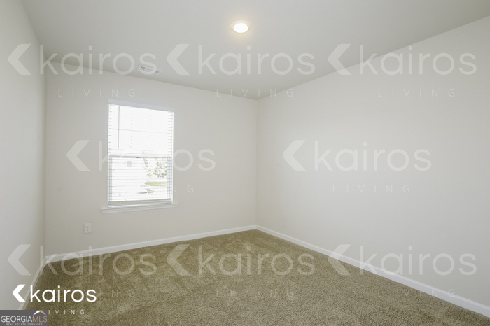 7008 Pinehurst Way North Macon, GA 31216 - Photo 8 of 16 an empty room with a window