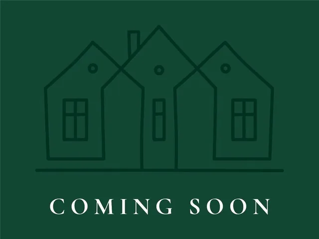 a view of a door and an empty space