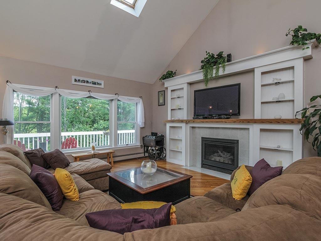 107 Wallentine Road Bowdoinham, ME 04008 - Photo 7 of 35 The gas fireplace ensures cozy...