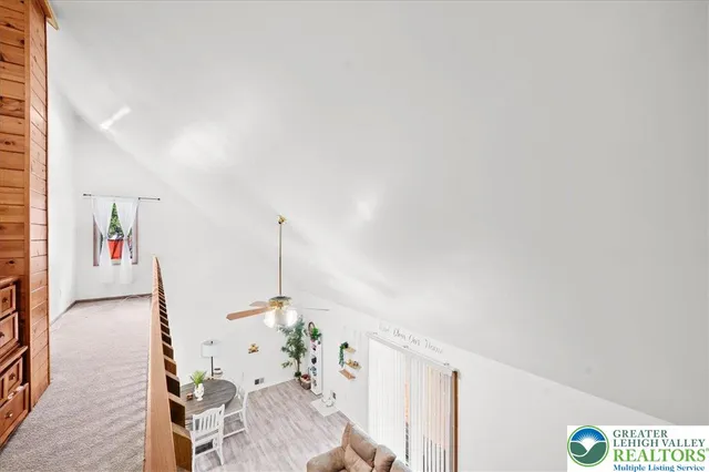 a view of livingroom with furniture and rug