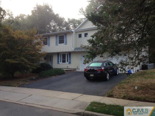 a car parked in front of a house