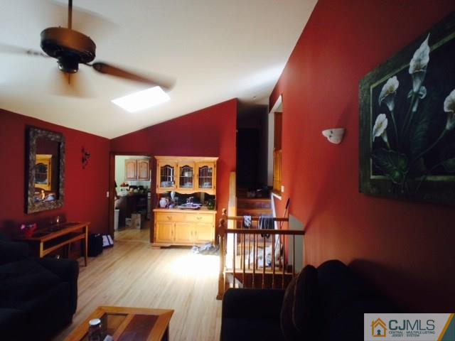 75 Rieder Road Spotswood, NJ 08884 - Photo 4 of 15 a view of a dining room with furniture a chandelier and wooden floor