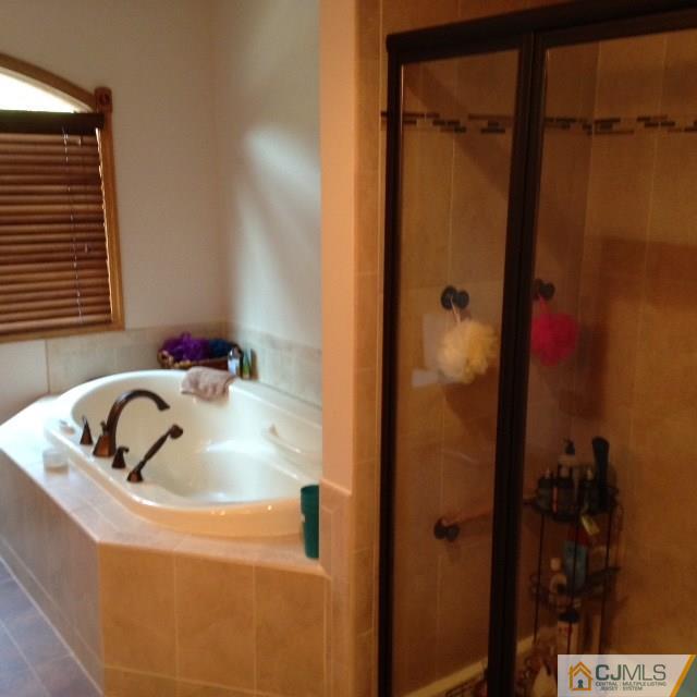 75 Rieder Road Spotswood, NJ 08884 - Photo 10 of 15 a bathroom with a sink and shower