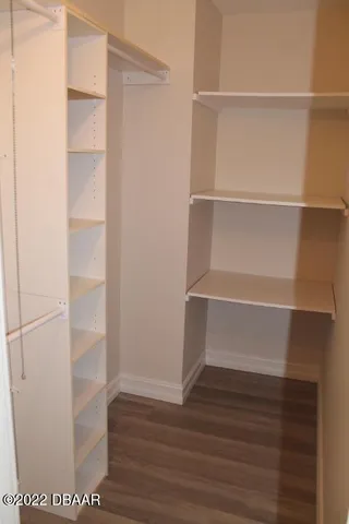 a view of an empty walk in closet