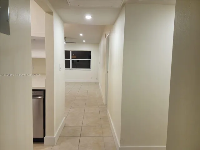 a bathroom with a shower and a tub