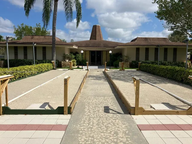 a view of swimming pool with outdoor seating and a lots of space