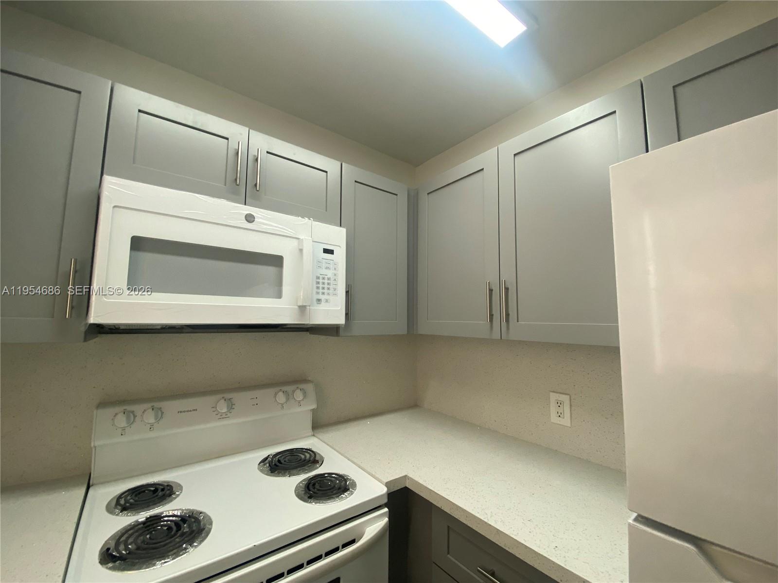 11350 Southwest 3rd Street, Unit A Sweetwater, FL 33174 - Photo 6 of 18 a view of kitchen