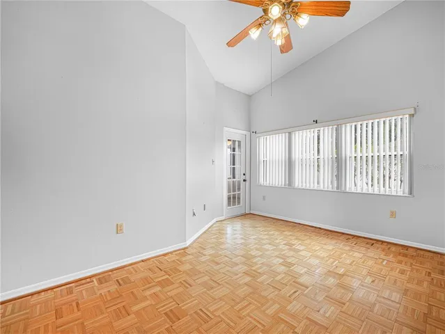 a view of an empty room with a window