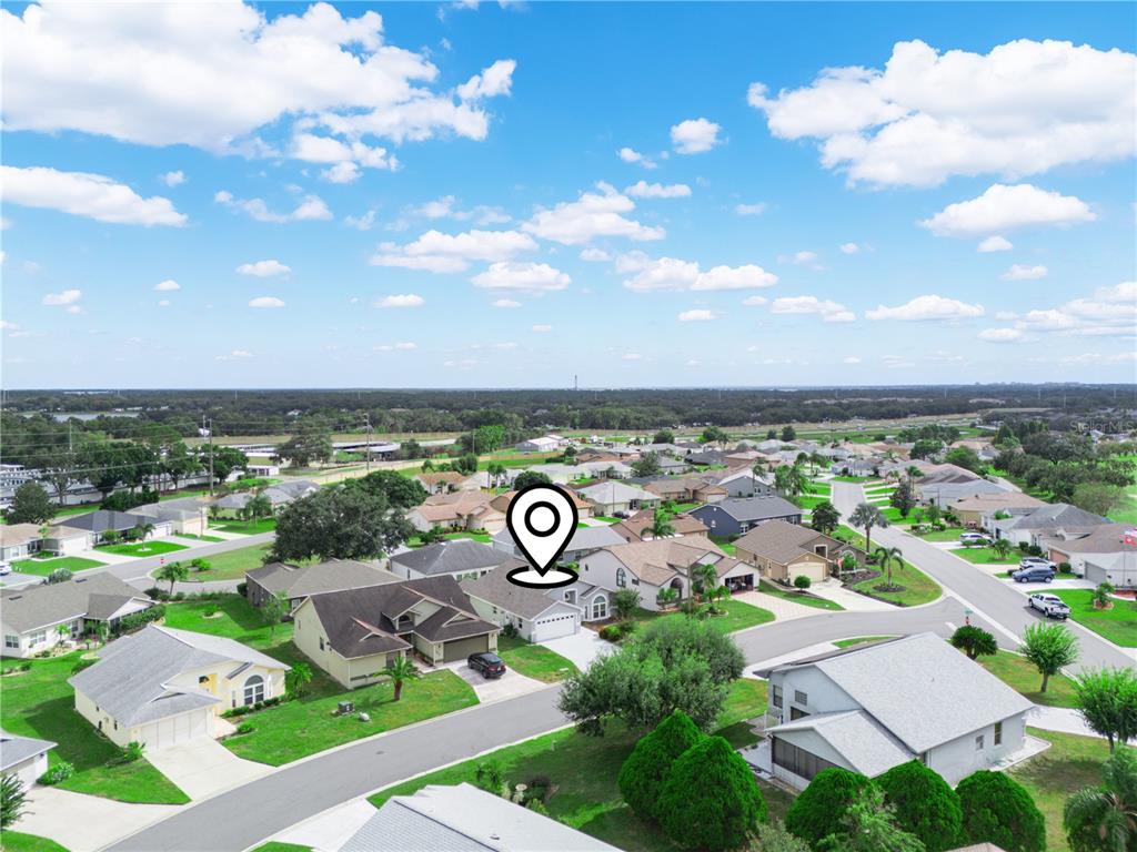 6011 Condor Drive Lakeland, FL 33809 - Photo 21 of 26 a view of a street with a yard