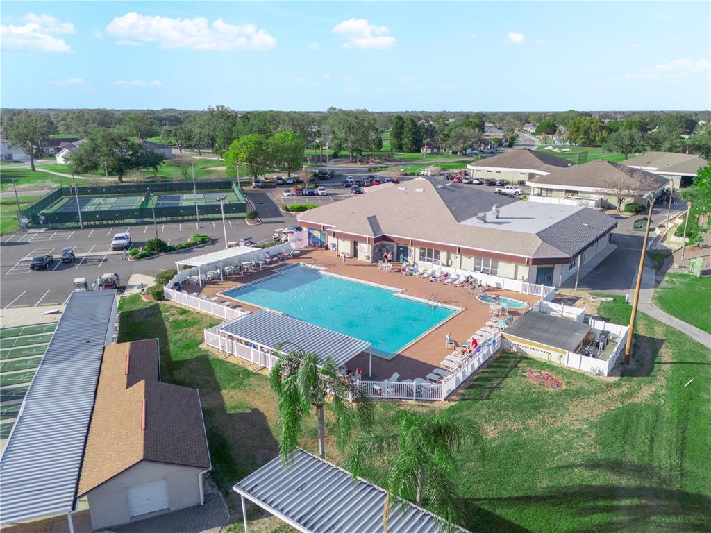 6011 Condor Drive Lakeland, FL 33809 - Photo 26 of 26 an aerial view of a house with a garden and lake view