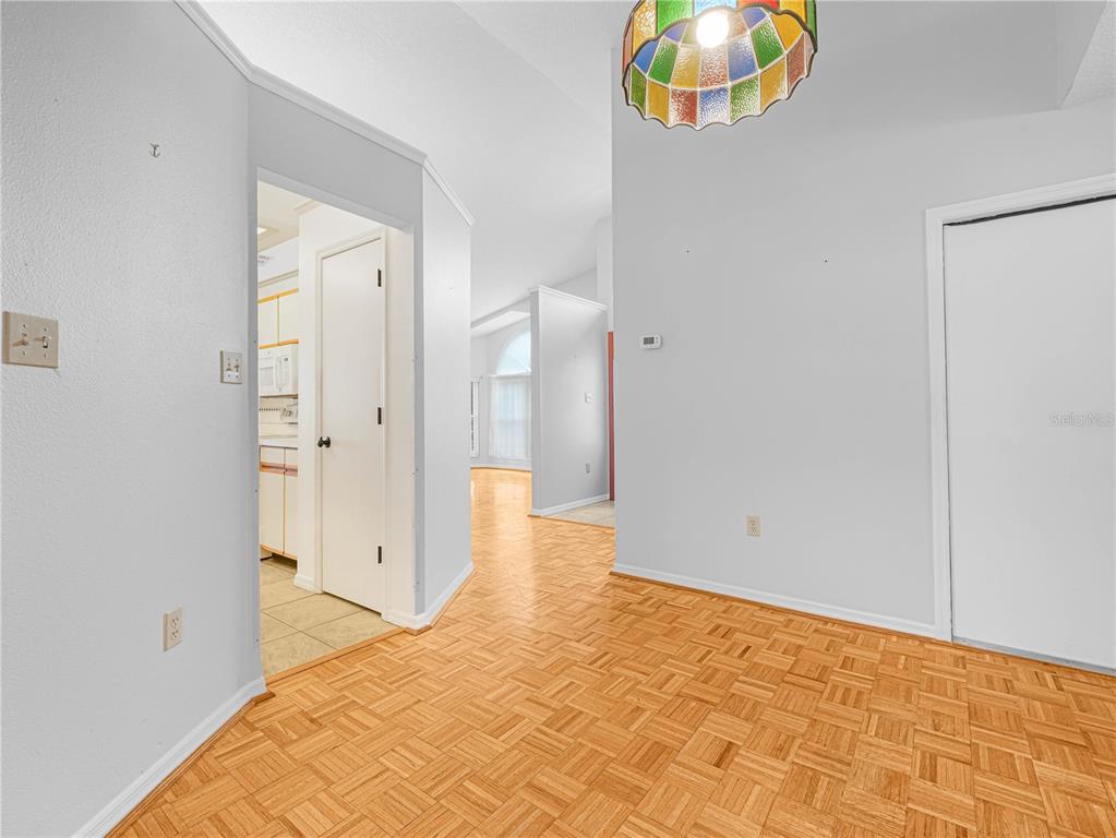 6011 Condor Drive Lakeland, FL 33809 - Photo 9 of 26 a view of a room with wooden floor and window