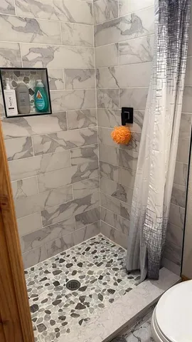 a bathroom with a sink and toilet