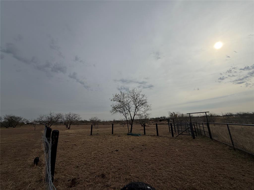 6051 County Road 1030 B Rice, TX 75155 - Photo 23 of 23 a view of a dry yard with wooden fence