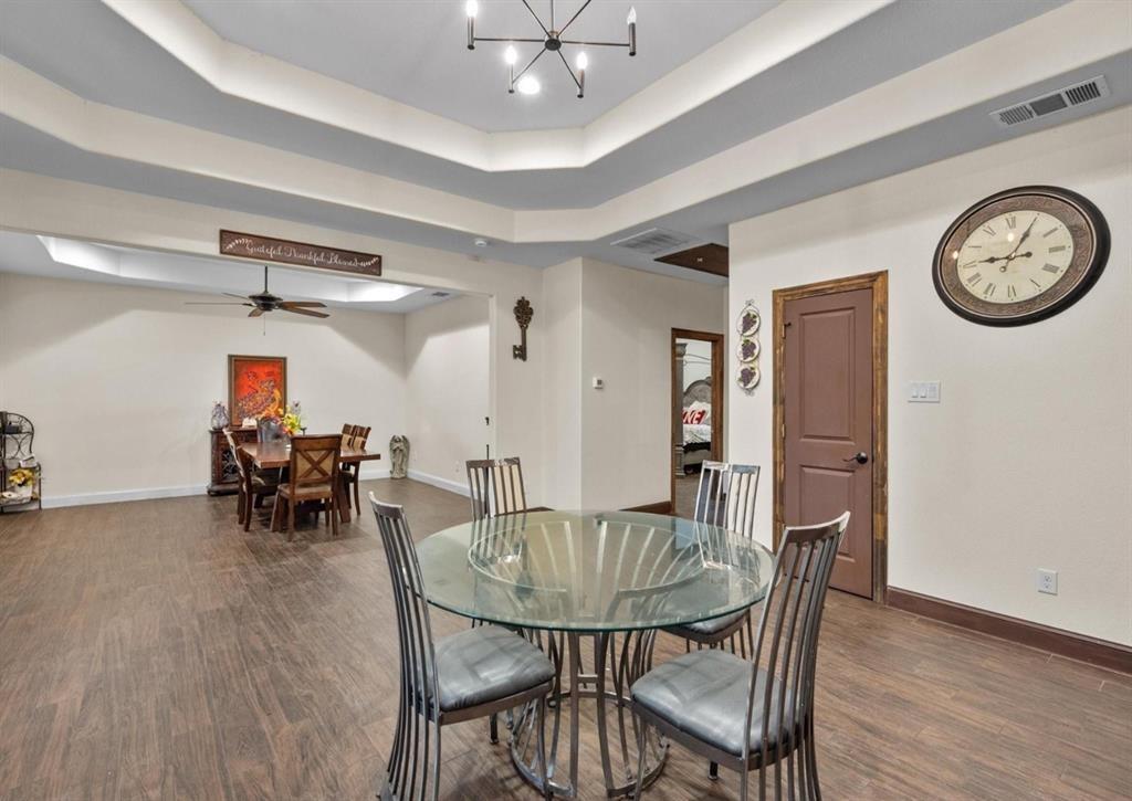 6051 County Road 1030 B Rice, TX 75155 - Photo 4 of 23 a view of a dining room with furniture and a large window
