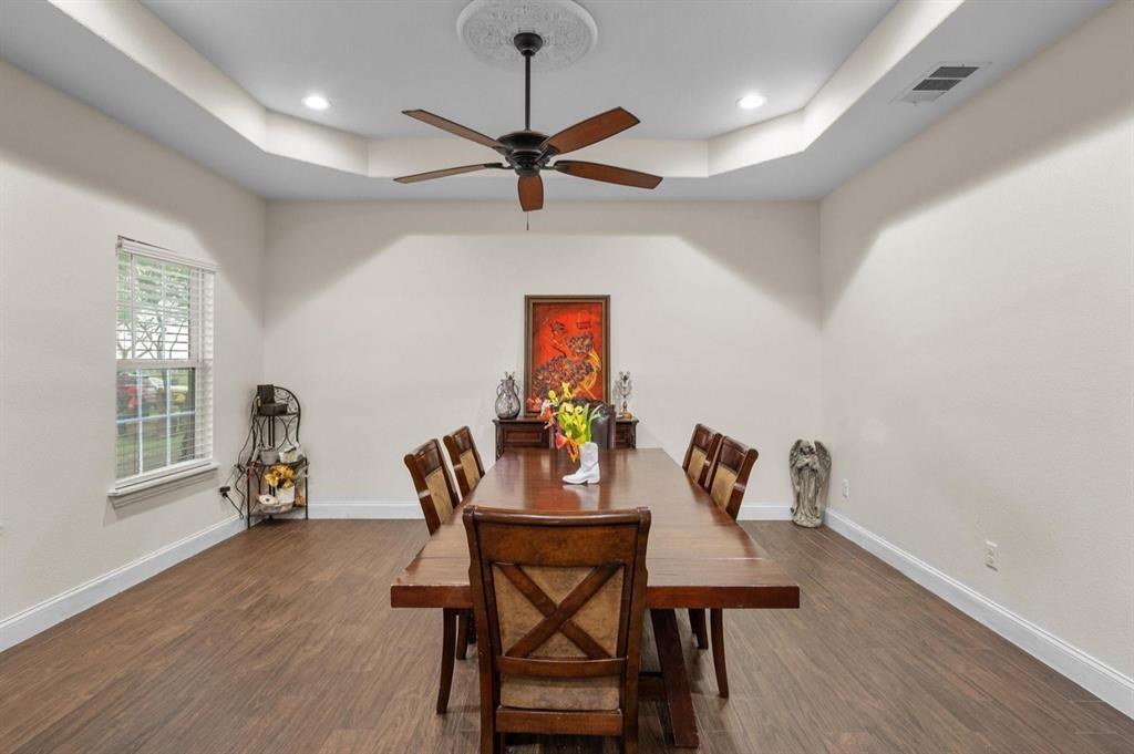 6051 County Road 1030 B Rice, TX 75155 - Photo 5 of 23 a view of a dining room with furniture window and wooden floor