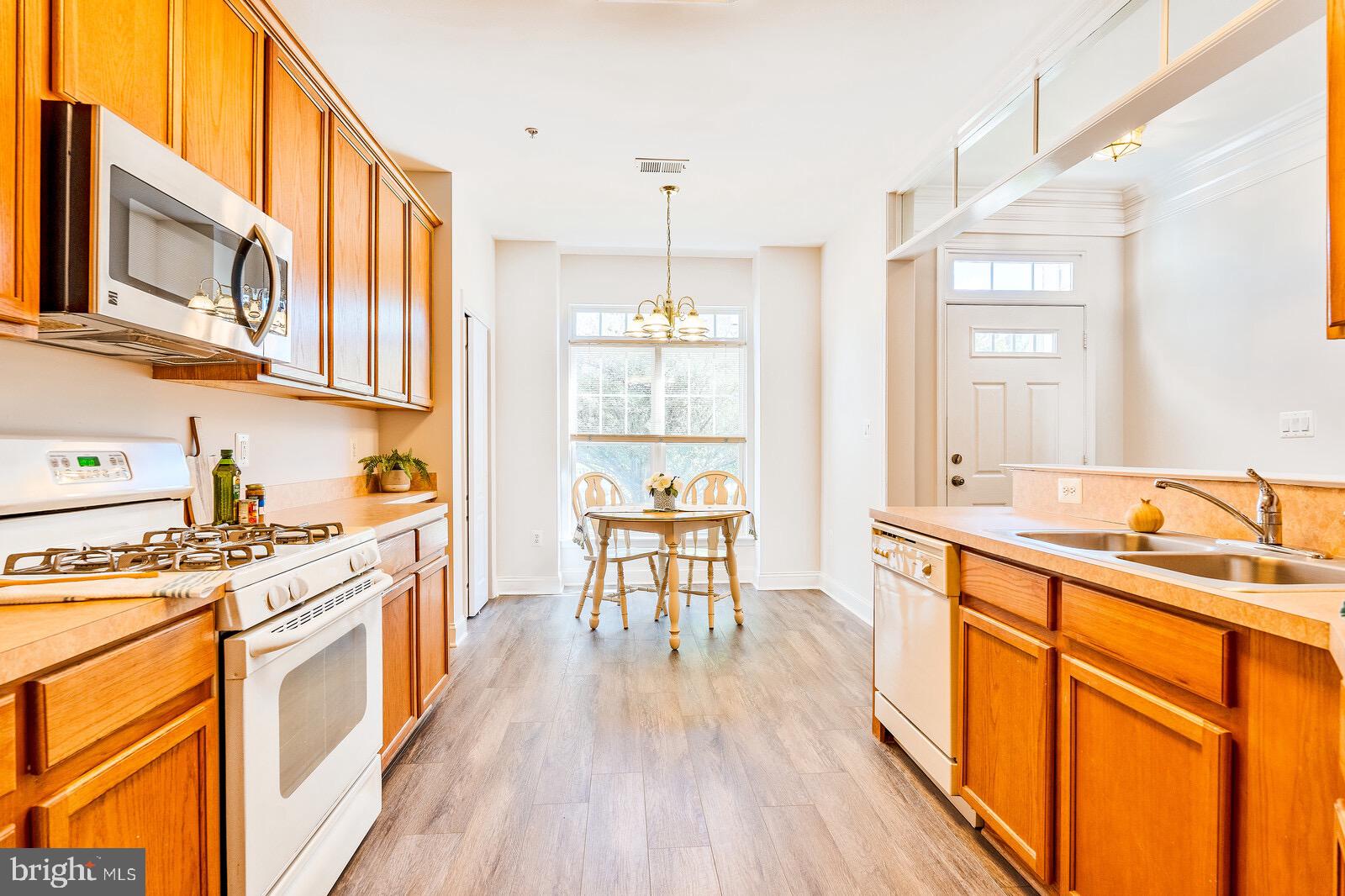 13132 Brooktree Lane Laurel, MD 20707 - Photo 2 of 35 GALLEY AREA TO THE BRIGHT BREAKFAST AREA !