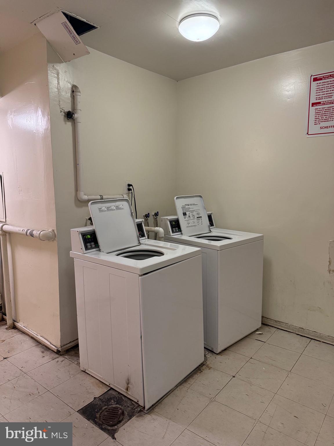 3754 Bel Pre Road, Unit 37541 Silver Spring, MD 20906 - Photo 26 of 28 Common Laundry Room