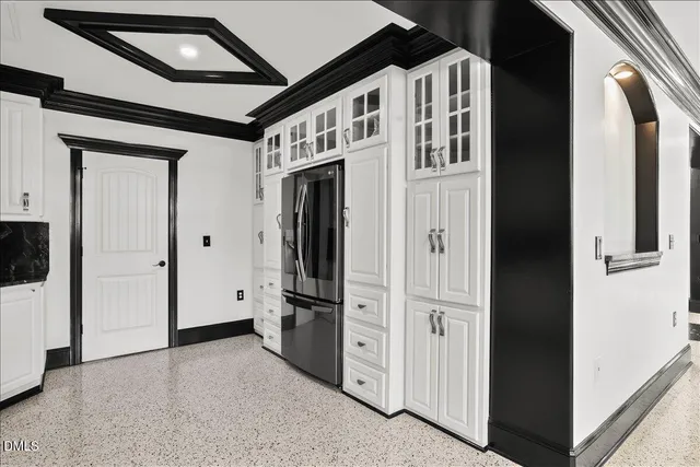 a view of an entryway with a kitchen