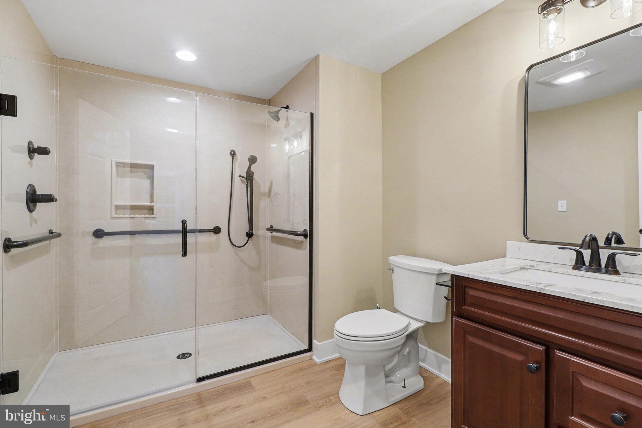 626 Sand Hill Road Hershey, PA 17033 - Photo 13 of 29 a bathroom with a sink a toilet and shower
