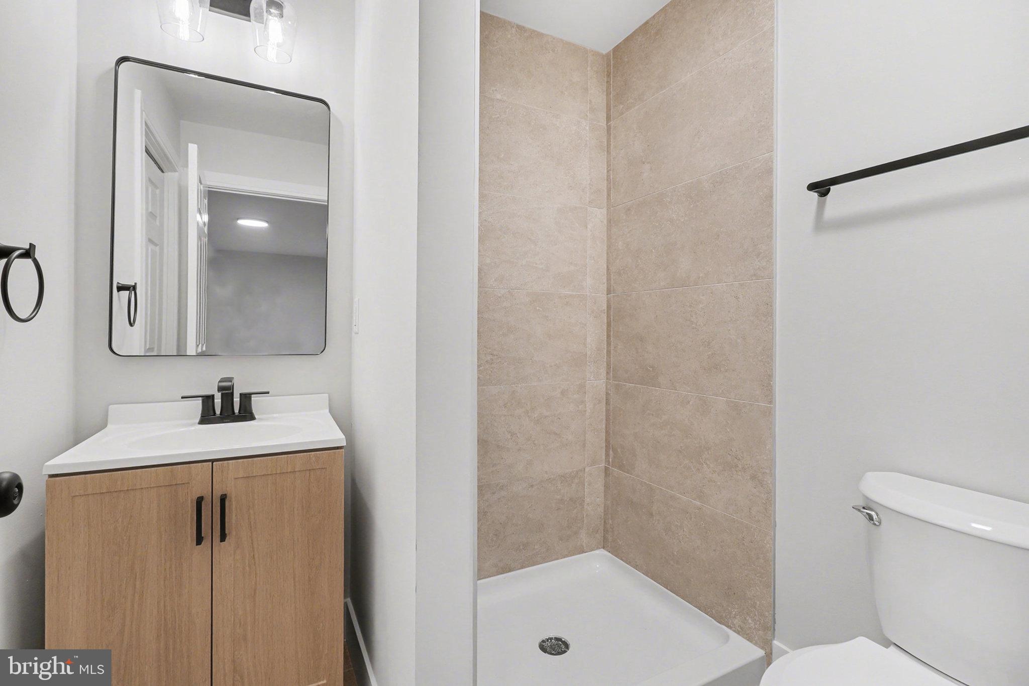 626 Sand Hill Road Hershey, PA 17033 - Photo 23 of 29 a bathroom with a sink a toilet and shower