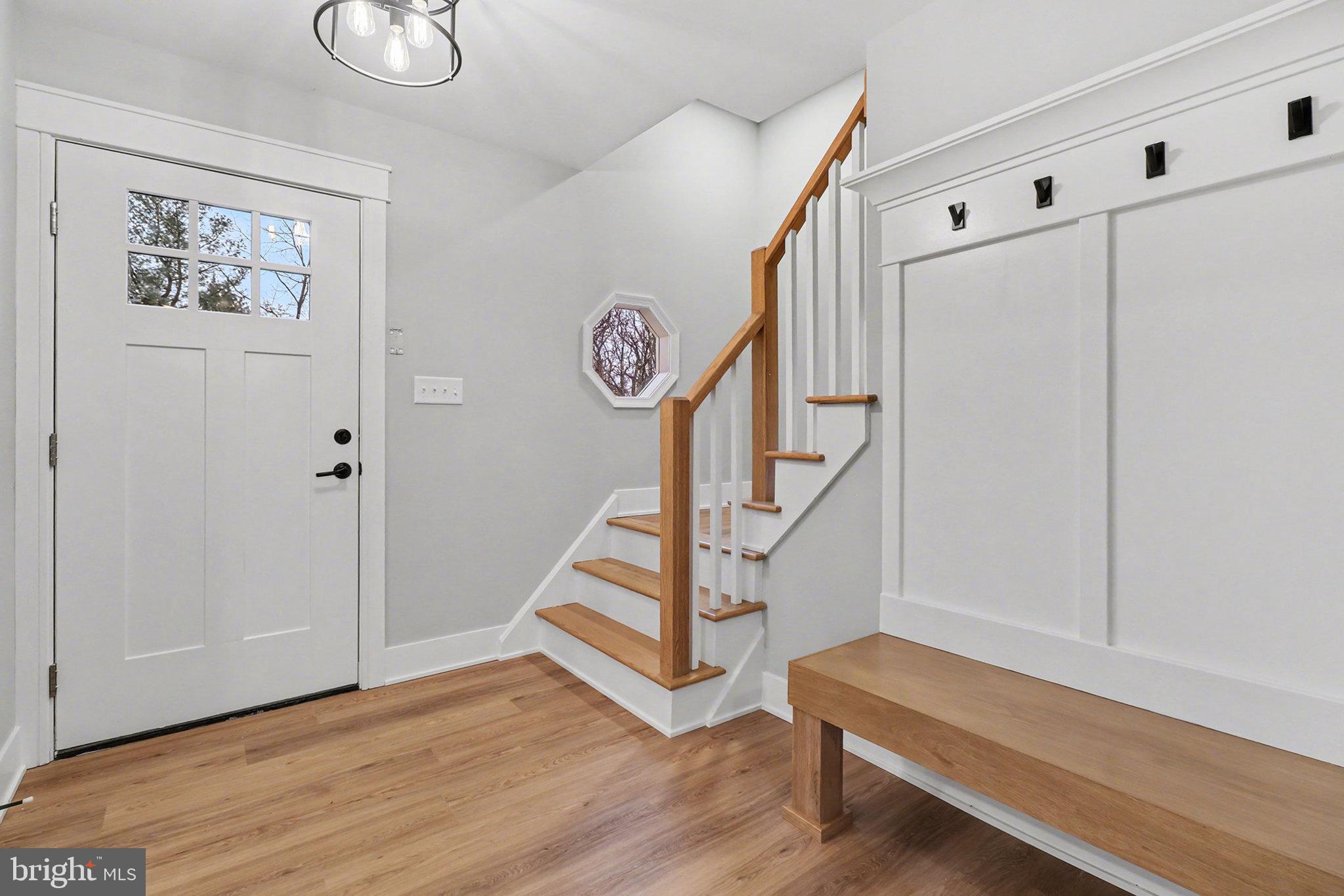 626 Sand Hill Road Hershey, PA 17033 - Photo 6 of 29 a view of entryway with stairs and wooden floor