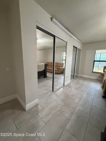 a bathroom with a shower and a toilet
