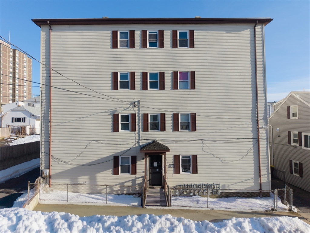 144 Choate Street Fall River, MA 02723 - Photo 2 of 42 a front view of a house with garden