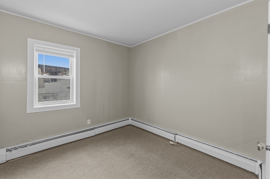 144 Choate Street Fall River, MA 02723 - Photo 24 of 42 an empty room with a window