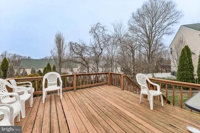 a view of roof deck with patio