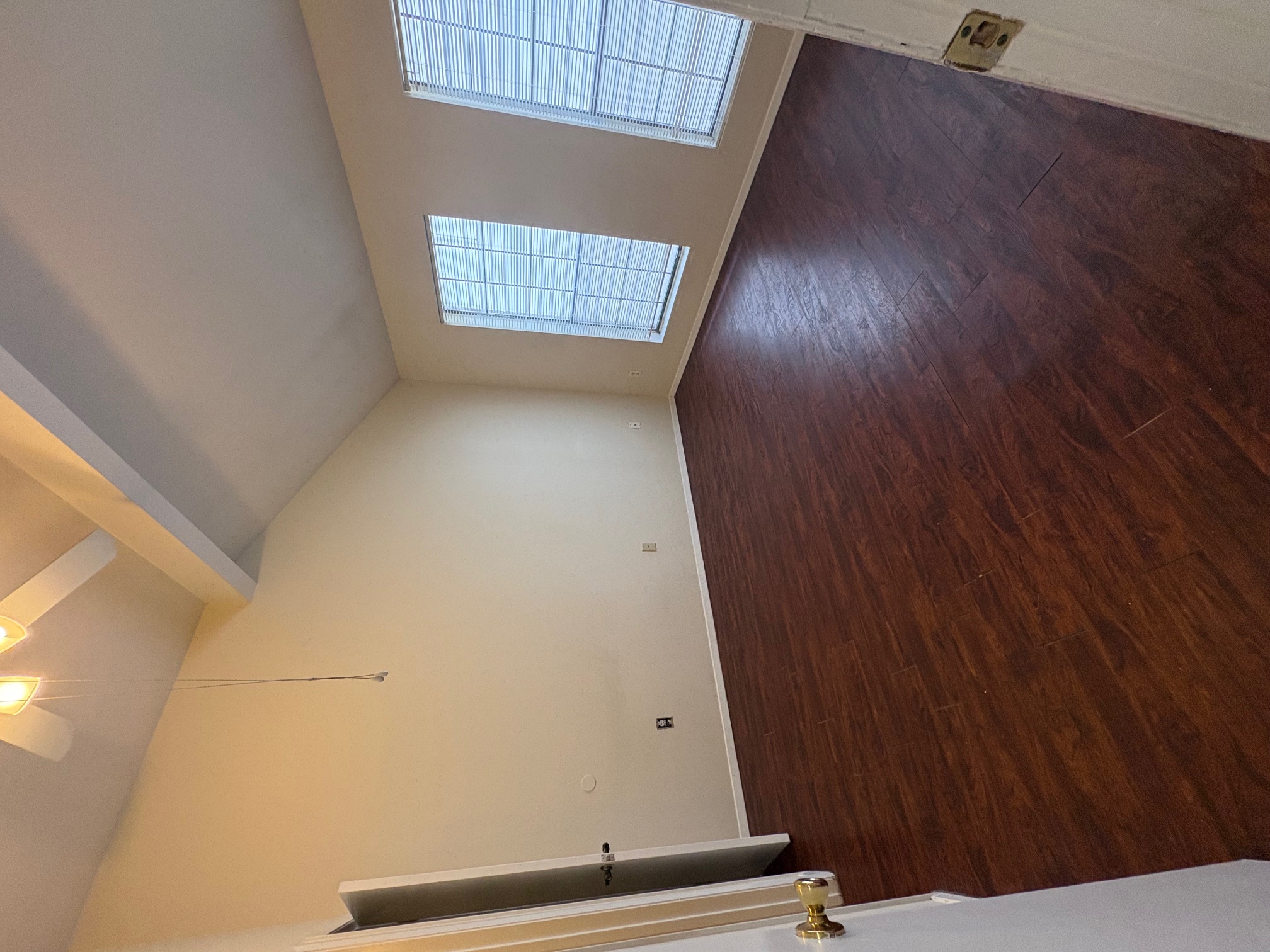 2801 Rio Grande Street, Unit 303 Austin, TX 78705 - Photo 10 of 11 Spare room with dark wood-style flooring and ceiling fan