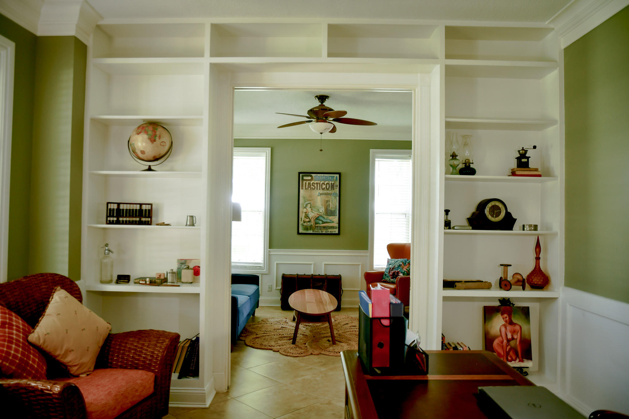 18263 River Oaks Drive Jupiter, FL 33458 - Photo 11 of 24 a living room with furniture and a fireplace
