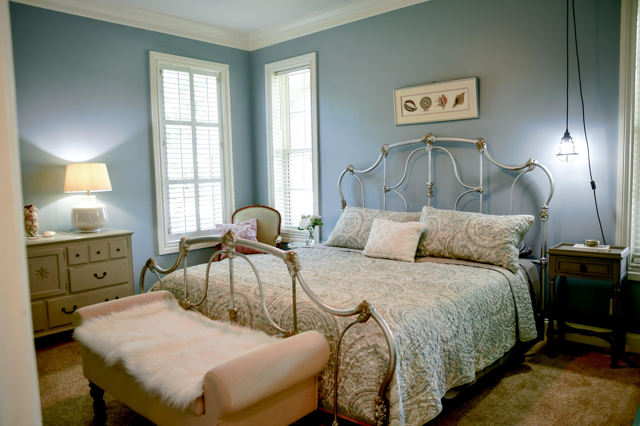 18263 River Oaks Drive Jupiter, FL 33458 - Photo 17 of 24 a bedroom with a bed and a dresser next to a window