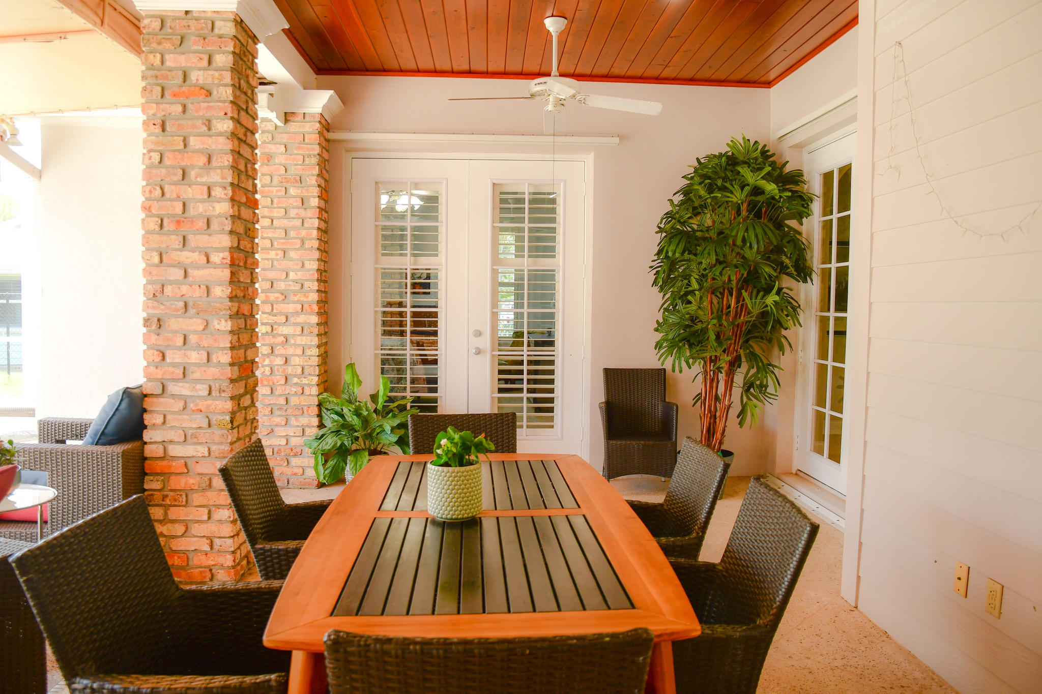 18263 River Oaks Drive Jupiter, FL 33458 - Photo 19 of 24 a view of balcony with a potted plant and outdoor seating