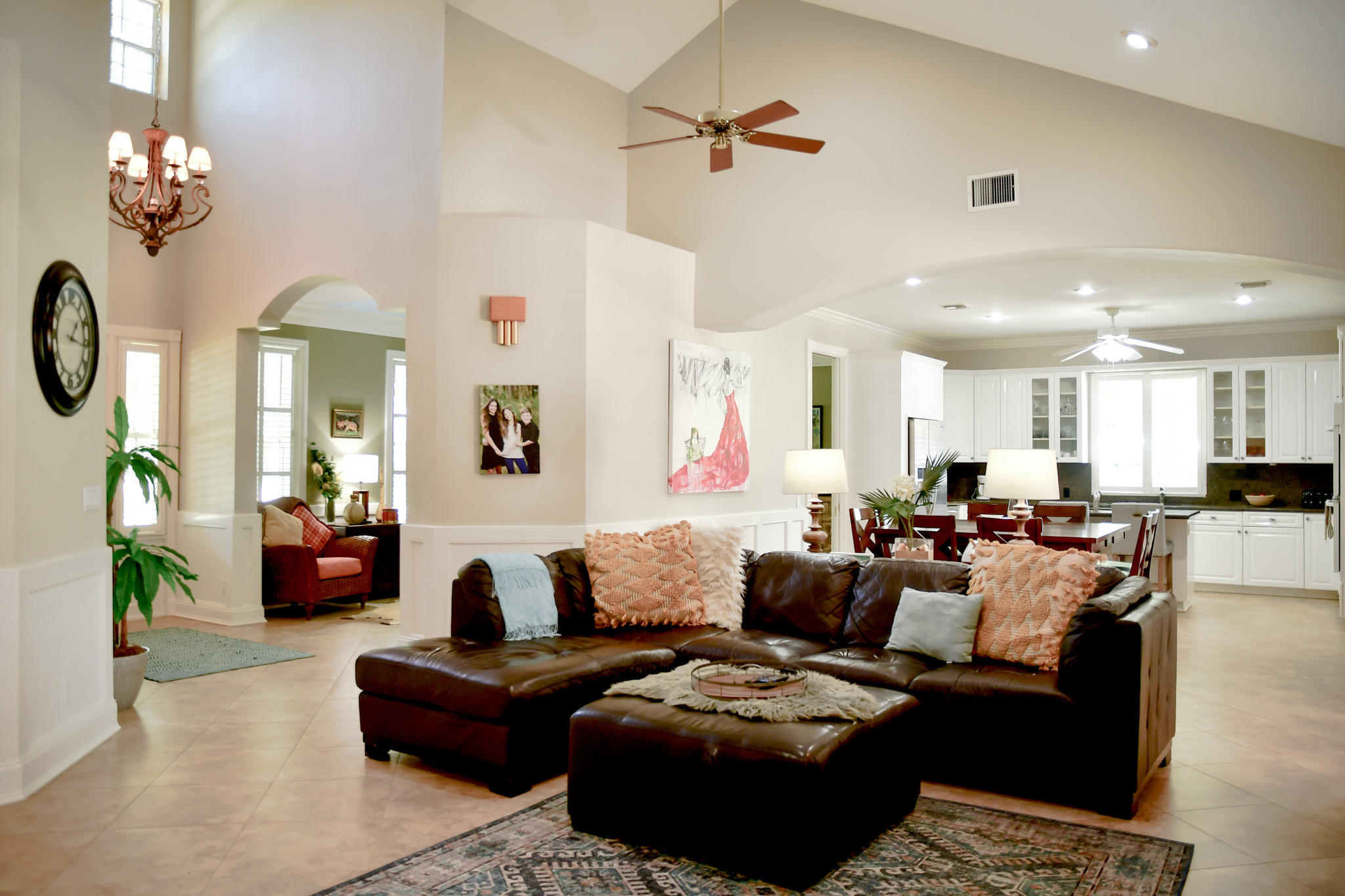 18263 River Oaks Drive Jupiter, FL 33458 - Photo 3 of 24 a living room with furniture and a chandelier