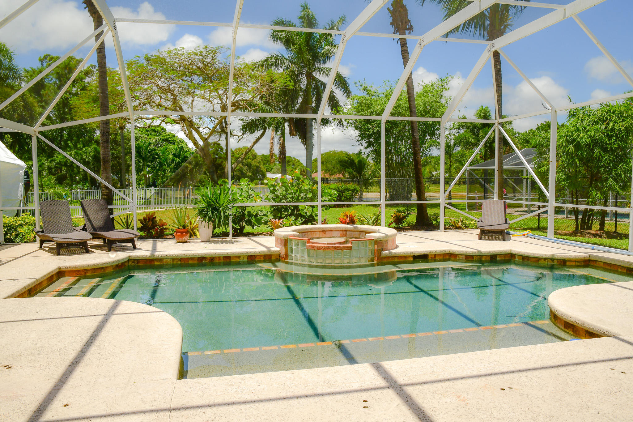18263 River Oaks Drive Jupiter, FL 33458 - Photo 23 of 24 a view of swimming pool with chairs