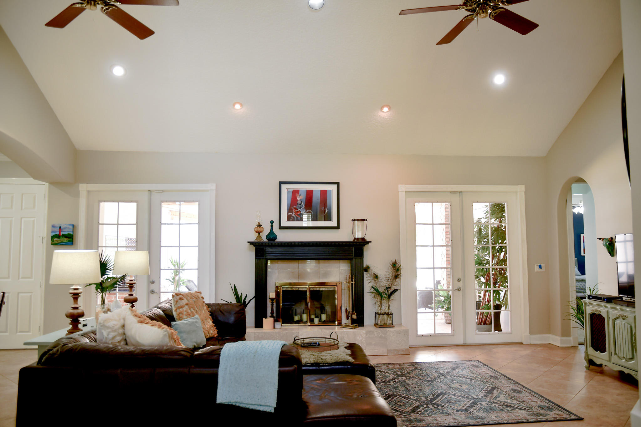 18263 River Oaks Drive Jupiter, FL 33458 - Photo 4 of 24 a living room with furniture and a fireplace