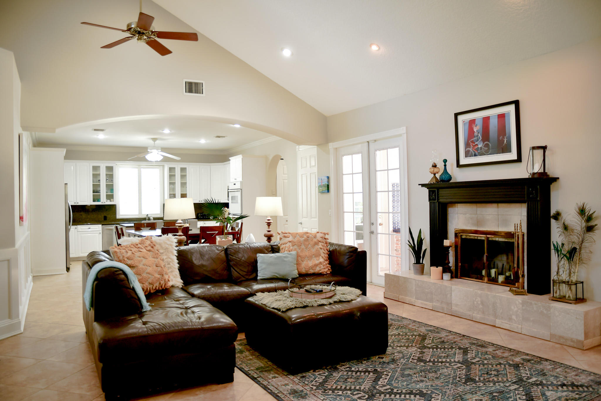 18263 River Oaks Drive Jupiter, FL 33458 - Photo 6 of 24 a living room with furniture and a fireplace