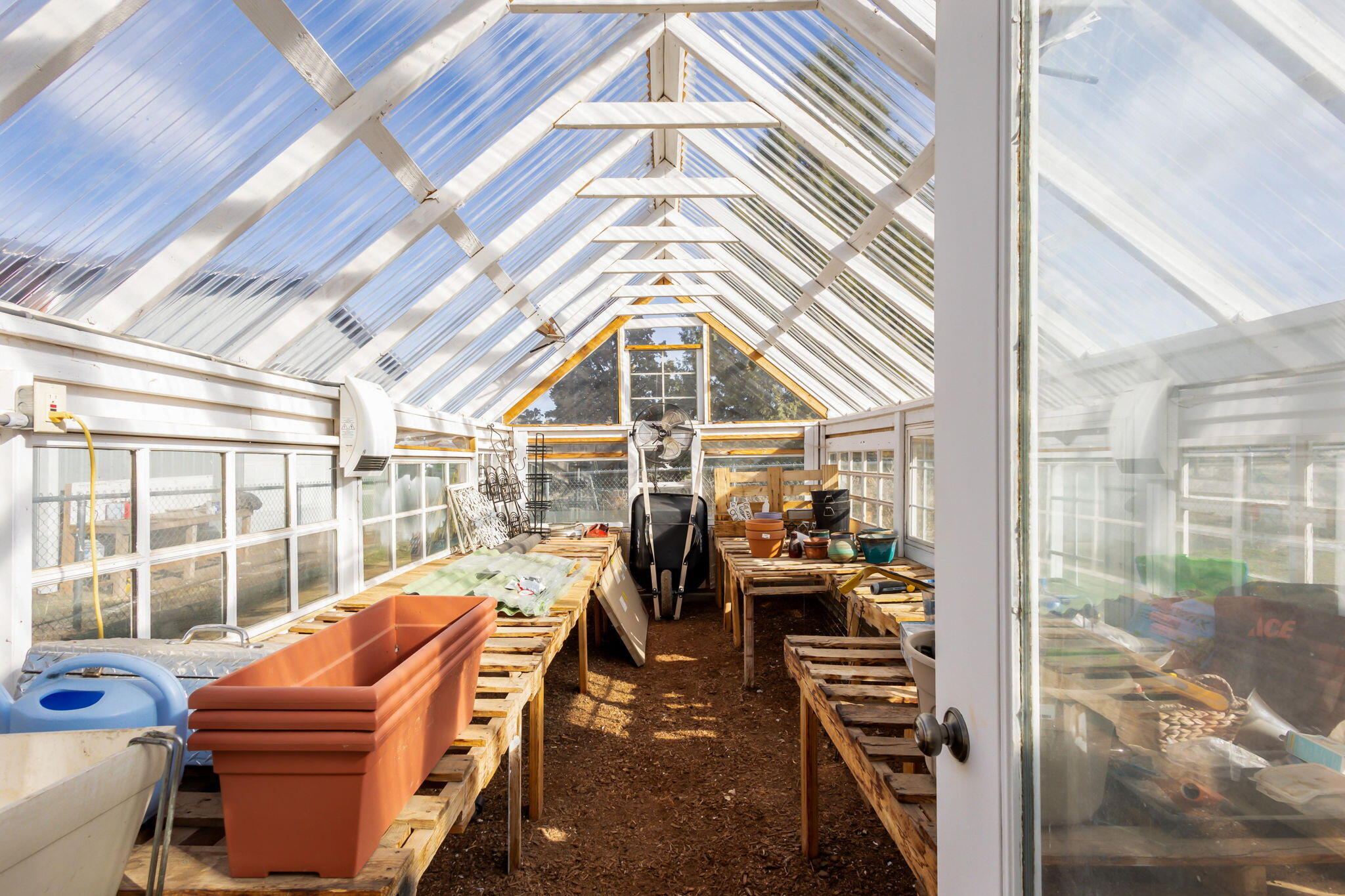 13680 Southwest Rust Bucket Road Powell Butte, OR 97753 - Photo 51 of 58 Fantastic greenhouse and outdoor garden area.